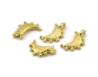 May include: Four gold-toned crescent moon charms with textured surfaces and small bead accents around the edges. Each charm has a loop for attaching to jewelry.
