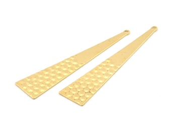 May include: Two gold-toned metal earring pendants with a hammered texture. Each pendant is shaped like a long, narrow triangle with a small loop at the top.