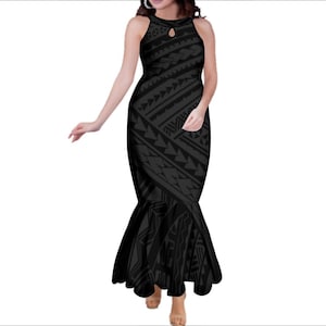 May include: Black sleeveless maxi dress with a keyhole neckline and a mermaid hem. The dress features a repeating geometric pattern in shades of black and gray. The dress is form-fitting through the bodice and flares out at the bottom.