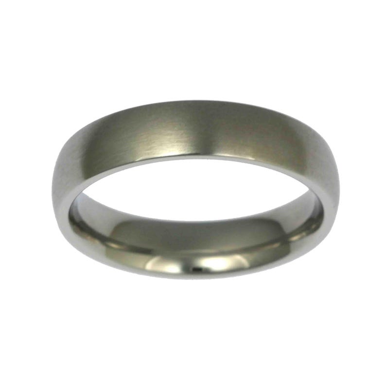 Side profile product image of a 5mm brushed stainless steel band ring centered against a plain white background. The ring features a matte brushed exterior with a soft silver tone and subtle linear grain texture. Its edges are smoothly rounded, and the interior is polished and slightly domed for a comfort fit. Minimalist, unisex wedding band with a clean, modern, and timeless design ideal for everyday wear.