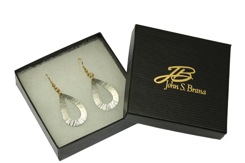 Chased Aluminum Open Teardrop Earrings in a Black Gift Box with Gold Logo