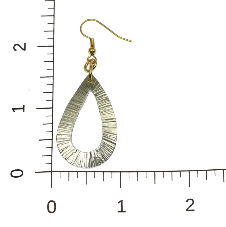Chased Aluminum Open Teardrop Earrings on a Ruler for Size Dimensions