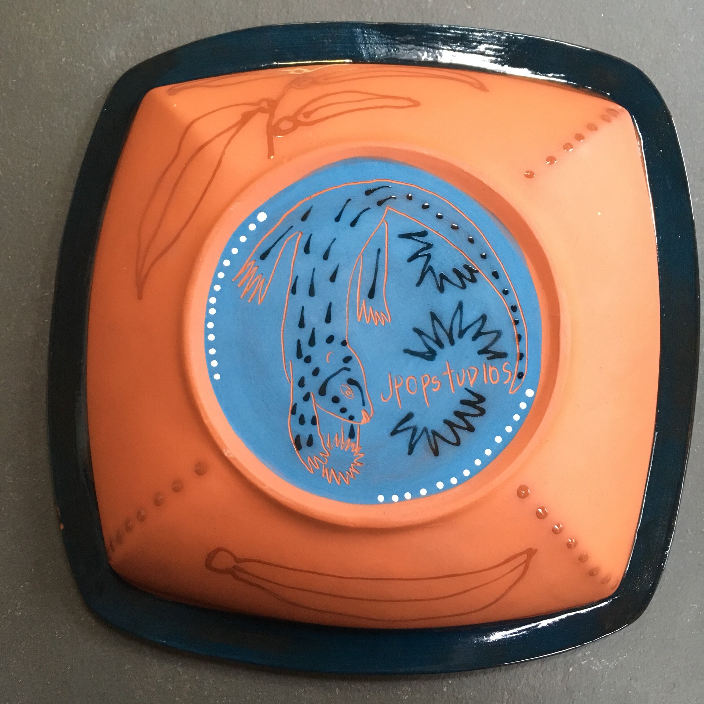 Otter handpainted ceramic bowl, sgraffito carved