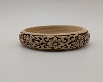 Vintage Carved Celluloid Bangle Bracelet with Carved Floral Motif
