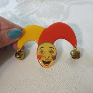 Vintage Harlequin Court Jester Clown Brooch Pin Masquerade Mardi Gras JINGLE BELL DANGLES Hard Plastic with Glossy Clear Coating 3-1/8&quot; Wide