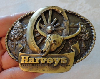 Vintage Harvey's Wagon Wheel Hotel Casino Belt Buckle 1994 Siskiyou Buckle Co Made in USA Brass Western Wear Design Buckle 2-1/4" x 3"