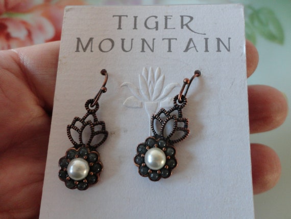 Tiger store mountain earrings