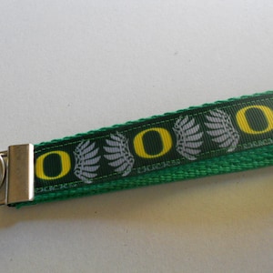 Oregon Ducks Inspirierter Schlüsselanhänger U of O Themenband Bild 1