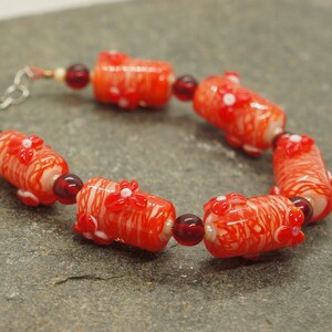 Red and white handmade lampwork glass bead bracelet