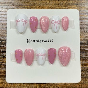 Coquette pink press on short almond acrylic nails