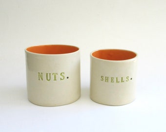 nuts and shells  ...  hand built porcelain containers ...  ceramic serving pieces