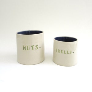 nuts and shells  ...  hand built porcelain containers ...  hand made ceramic charcuterie serving pieces