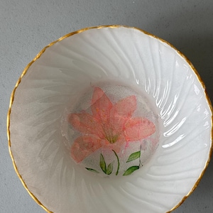 May include: A rustic wooden sign with the text "Welcome to our home" in white lettering. The sign features a distressed finish and a simple, inviting design, perfect for entryway decor.