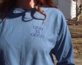 God is good. Long sleeve T. Denim Blue T with tone on tone embroidery. Ready to ship. UNISEX for men and women.