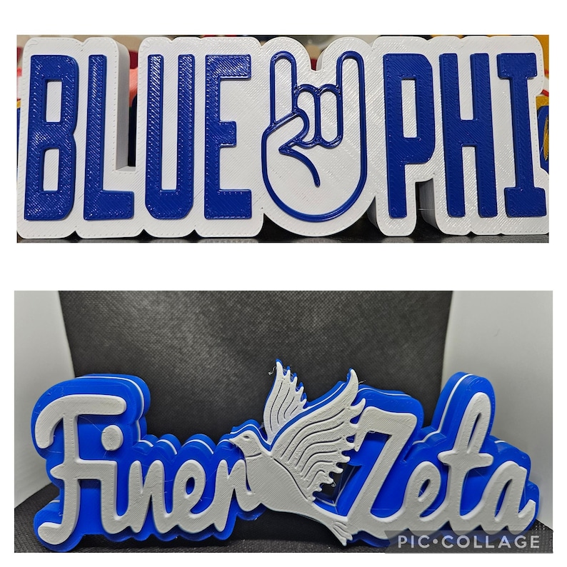 May include: Two 3D printed signs, one blue with white lettering that says "BLUE PHI" and a white rock and roll hand symbol, and the other blue with white lettering that says "Finer Zeta" and a white dove.