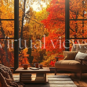 May include: A cosy living room with a large window overlooking a colourful autumn forest. A brown armchair with a throw pillow sits near a coffee table with books and mugs.