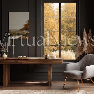 May include: An interior scene featuring a wooden desk, a grey armchair, and a window with autumn foliage. The room includes a painting, candles, and decorative items, creating a warm and inviting atmosphere.