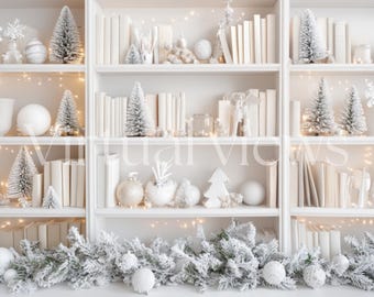 May include: White bookshelf with five shelves filled with books, decorative items, and small snow-covered pine trees. The bottom shelf is decorated with a garland of snow-covered pine branches.