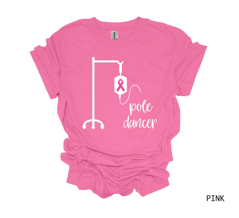 May include: Pink t-shirt with a white graphic of an IV pole and the text "pole dancer".