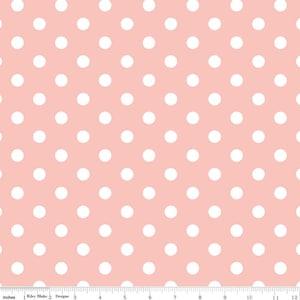 May include: Pink fabric with a white polka dot pattern. The dots are evenly spaced and cover the entire surface of the fabric.