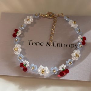 Elegant pearl blue beaded flower with adorable cherry bracelet | Japanese beads | cherry bracelet | original design | viral bracelet