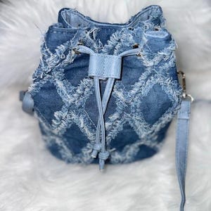 Bolso de mezclilla con cordón