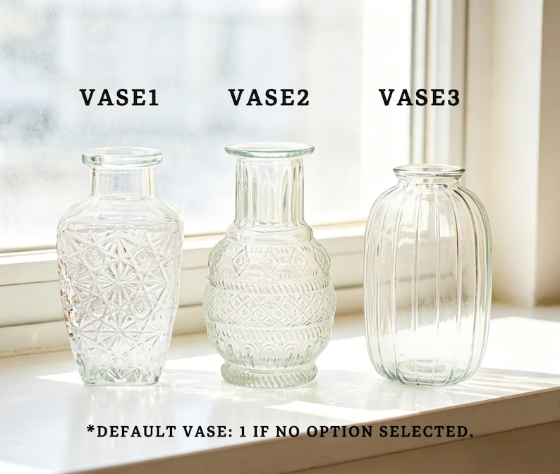 May include: Three clear glass vases with different designs are displayed. The vases are labeled "VASE1", "VASE2", and "VASE3". The first vase has a geometric pattern, the second has an embossed design, and the third has vertical ridges. Text at the bottom reads "*DEFAULT VASE: 1 IF NO OPTION SELECTED."