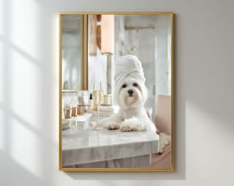 May include: A framed photograph featuring a white dog wearing a white towel on its head, posing in a bathroom setting. The dog is positioned in front of a marble countertop with a champagne glass. The frame is gold.