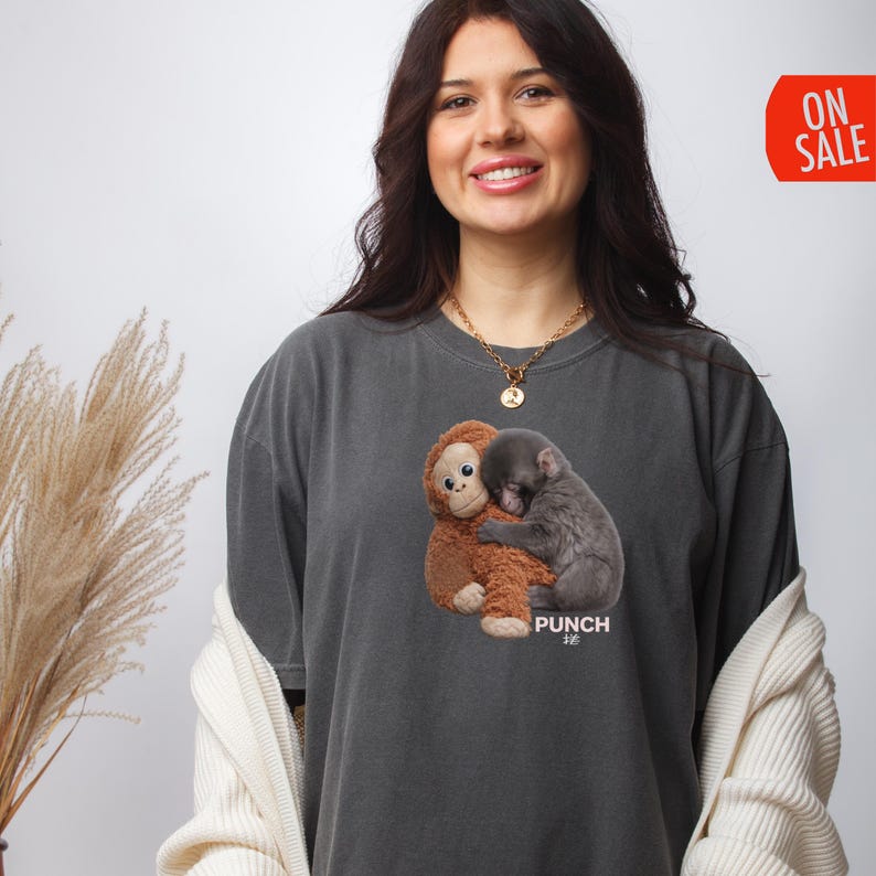 Monkey lover shirt featuring heartwarming baby monkey cuddle scene