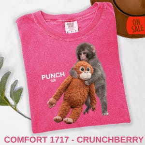 Animal lover gifted shirt featuring cute baby monkey punch theme