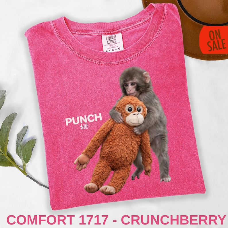 Animal lover gifted shirt featuring cute baby monkey punch theme