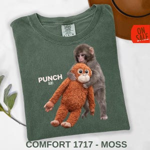 Viral monkey shirt design printed on black Comfort Colors 1717 tee