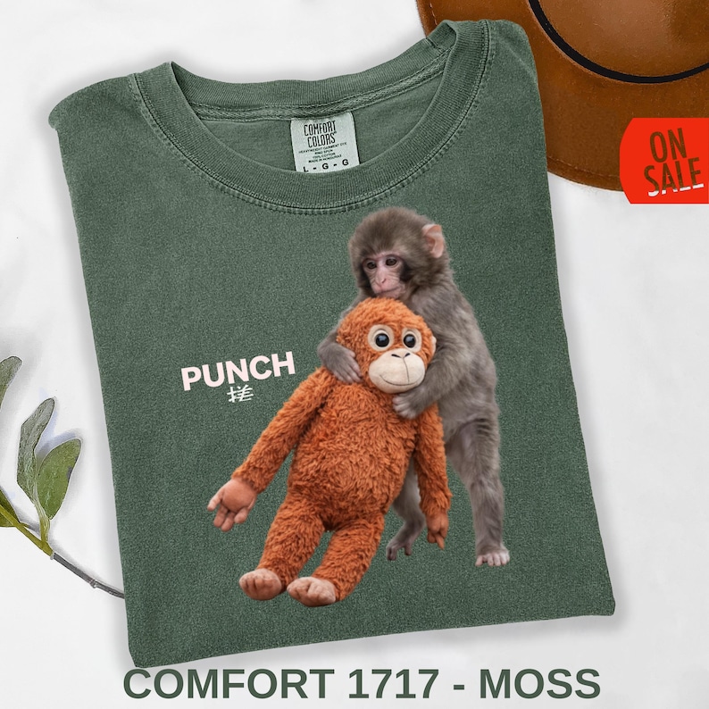 Viral monkey shirt design printed on black Comfort Colors 1717 tee