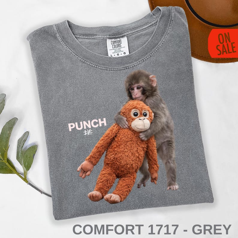 Funny monkey tee design with realistic baby monkey graphic