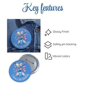 May include: A blue button with a glossy finish featuring a cartoon character, balloons, and the text "Anna's 7th Birthday." The button has a safety pin backing and vibrant colors.