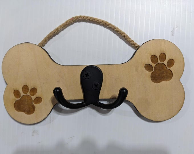 Wooden laser cut and engraved leash holder! Add a name or customize it with a breed. There are lots to choose from.