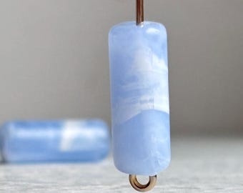 Contas tubulares de acrílico marmorizado em cristal branco e azul-centáurea, 18 x 7 mm (12)