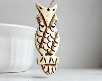 Pingente oval vintage esculpido em osso de búfalo, 66 mm (1 peça)