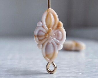 Geschnitzte Ivory Topaz Tan marmorierte Acryl Oval Perlen 16 x 10 mm (20)