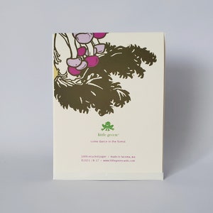 May include: A green frog illustration with the text "little green" and "come dance in the forest". The text below reads "100% recycled paper made in Tacoma, WA &copy;2021/8-17 www.littlegreencards.com".