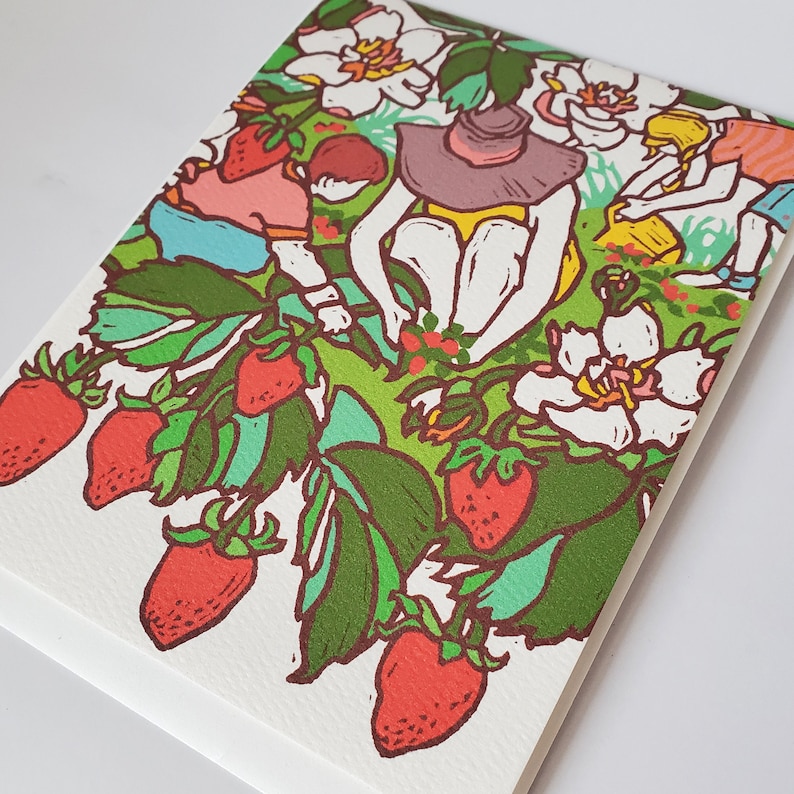 May include: A colorful illustration of a strawberry patch with a woman in a hat picking strawberries. The illustration features red strawberries, green leaves, and white flowers.