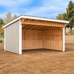 May include: A three-sided wooden run-in shed featuring light beige vertical siding, white trim, and a dark metal roof. The interior walls are constructed from natural wood panels, and the structure has an open front design with exposed rafters.