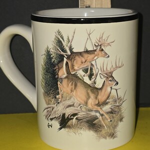 Collectible  Al Agnew coffee mugs featuring  stag design