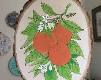 Oranges with blossoms wood burning