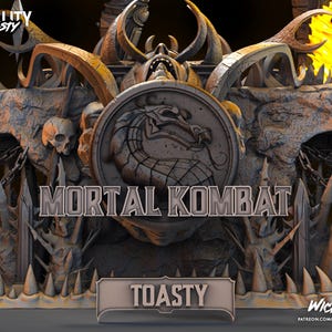 Puede incluir: Un modelo 3D impreso de un escenario de Mortal Kombat con un logotipo de drag&oacute;n, una calavera y las palabras "Fatality Toasty" y "Toasty".