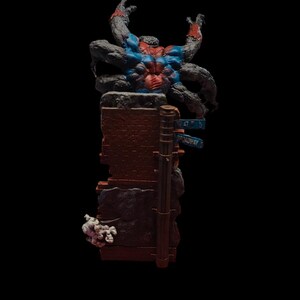 May include: A black and red action figure of a spider-like creature with multiple arms, standing on a broken brick wall with a blue street sign that reads "47th St Broadway".