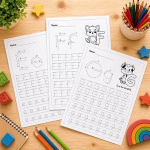 May include: Three white letter tracing worksheets with the letters E, F, and G. Each sheet has a space for a name, tracing guides, and illustrations of a fox and a giraffe. Colored pencils and wooden toys surround the worksheets.