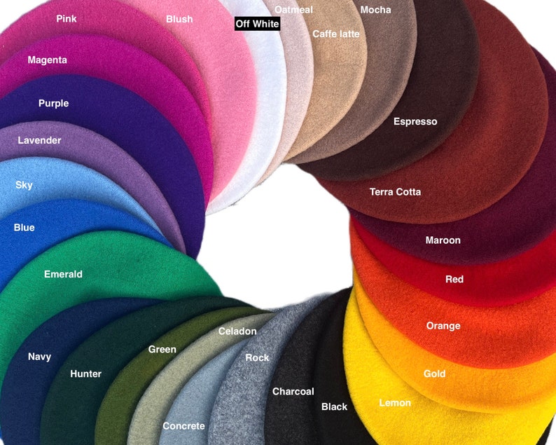 May include: A color chart of 20 different felt beret hats. The hats are arranged in a circle, with the colors ranging from pink to black. The colors are labeled with their names, such as "Pink", "Blush", "Off White", "Oatmeal", "Mocha", "Caffe latte", "Espresso", "Terra Cotta", "Maroon", "Red", "Orange", "Gold", "Lemon", "Black", "Charcoal", "Celadon", "Rock", "Concrete", "Green", "Hunter", "Navy", "Emerald", "Blue", "Sky", "Lavender", "Purple", and "Magenta".