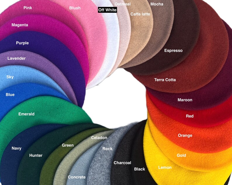 May include: A color chart of 20 different felt beret hats. The hats are arranged in a circle, with the colors ranging from pink to black. The colors are labeled with their names, such as "Pink", "Blush", "Off White", "Oatmeal", "Mocha", "Caffe latte", "Espresso", "Terra Cotta", "Maroon", "Red", "Orange", "Gold", "Lemon", "Black", "Charcoal", "Celadon", "Rock", "Concrete", "Green", "Hunter", "Navy", "Emerald", "Blue", "Sky", "Lavender", "Purple", and "Magenta".