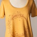 see more listings in the Women's Tanks / Tees section